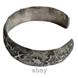 Important Vintage Andrew Gordon Sterling Silver Navajo Story telling Bracelet