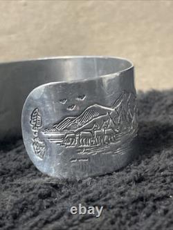 Vintage Native American Hand Carved Silver Bracelet, Symbolic Imaginary
