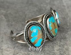Vintage Native American Navajo NUMBER 8 Turquoise CARINATED Sterling Bracelet