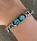 Vintage Native American Navajo Turquoise Sand cast Sterling silver Bracelet