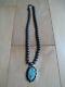 Vintage Navajo sterling silver pearls necklace and turquoise pendant