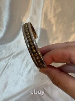 Vintage Sterling Native American Cuffed Bracelet with brass accent Signed MT 2.5