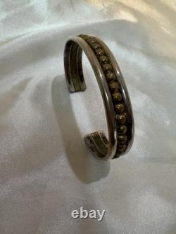 Vintage Sterling Native American Cuffed Bracelet with brass accent Signed MT 2.5